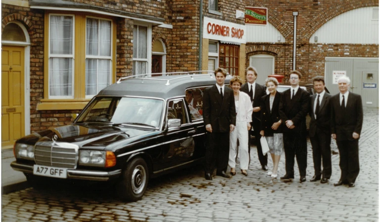 Scott Owen on set of Coronation Street with Tom Owen and Son funeral cars